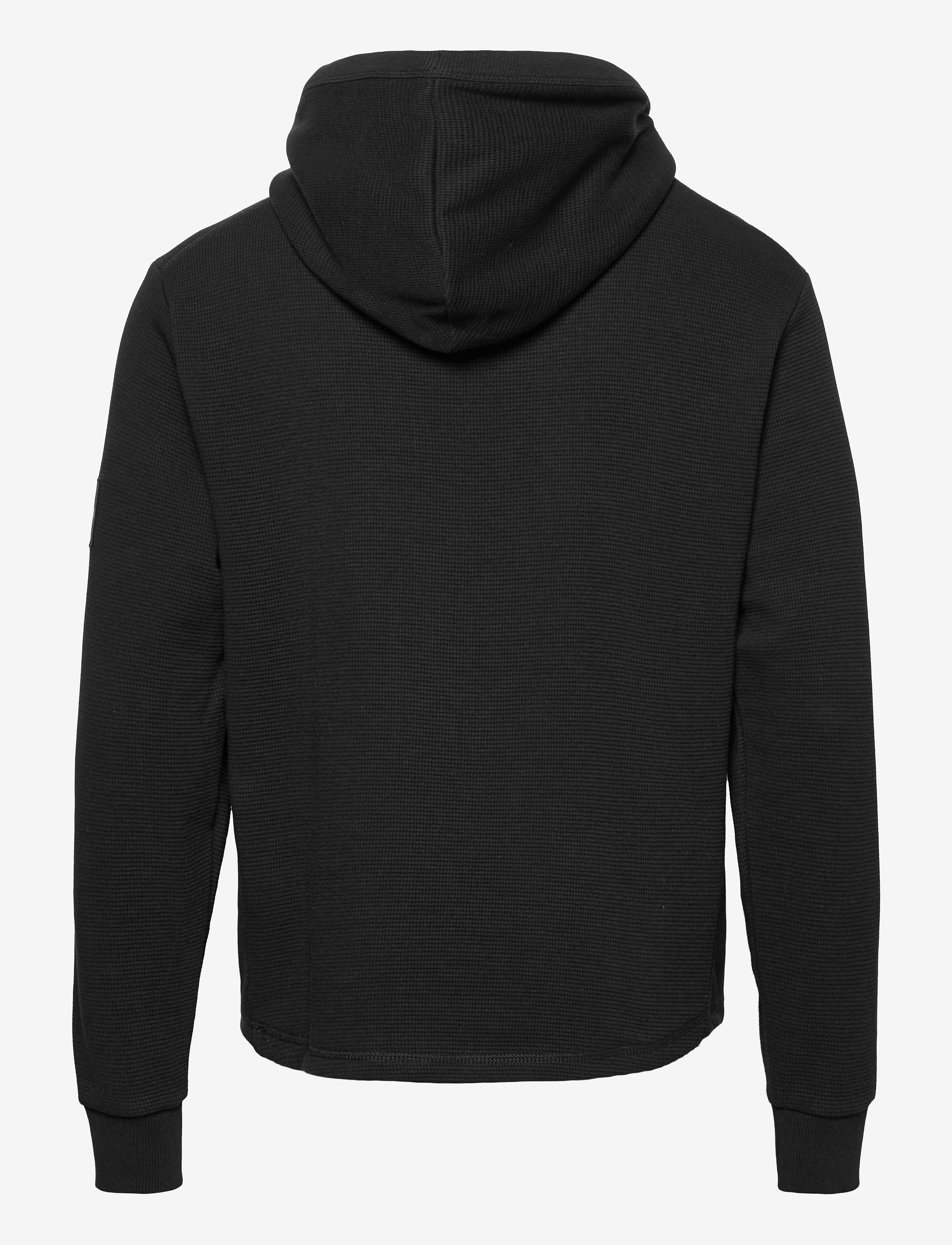 Calvin Klein Jeans - MONOGRAM BADGE WAFFLE L/S HOODIE - ck black - 1