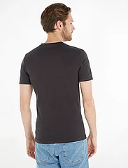 Calvin Klein Jeans - CORE MONOLOGO POCKET SLIM TEE - lühikeste varrukatega t-särgid - ck black - 3