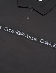 Calvin Klein Jeans - LOGO TAPE POLO - short-sleeved polos - ck black - 2
