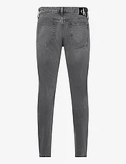 Calvin Klein Jeans - SLIM TAPER - kitsad teksad - denim black - 1