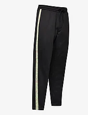 Calvin Klein Jeans - CUT OFF LOGO TAPE HWK PANT - joggingbyxor - ck black - 3
