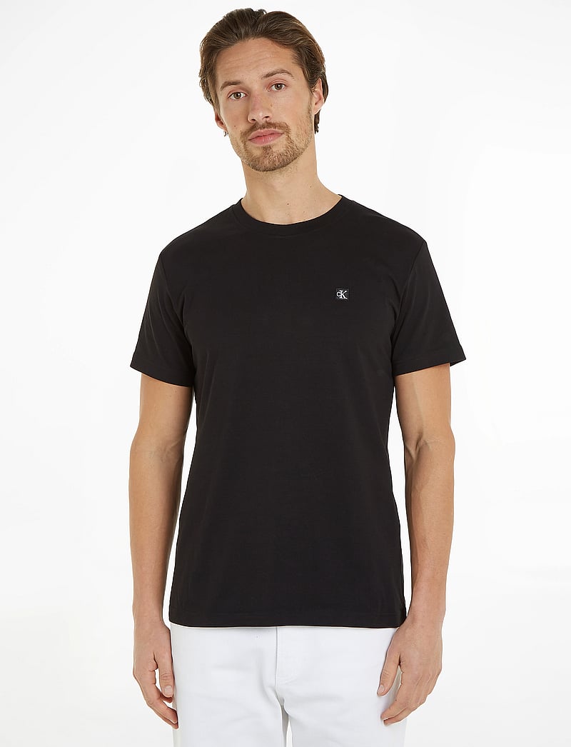 Calvin Klein Jeans - CK EMBRO BADGE TEE - kurzärmelig - ck black - 0