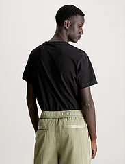 Calvin Klein Jeans - CK EMBRO BADGE TEE - alhaisimmat hinnat - ck black - 5