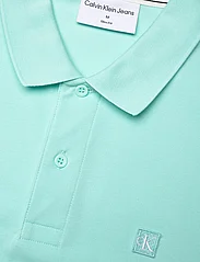 Calvin Klein Jeans - CK EMBRO BADGE SLIM POLO - polo marškinėliai trumpomis rankovėmis - blue tint - 2