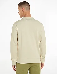 Calvin Klein Jeans - CK EMBRO BADGE CREW NECK - sportiska stila džemperi - green haze - 2