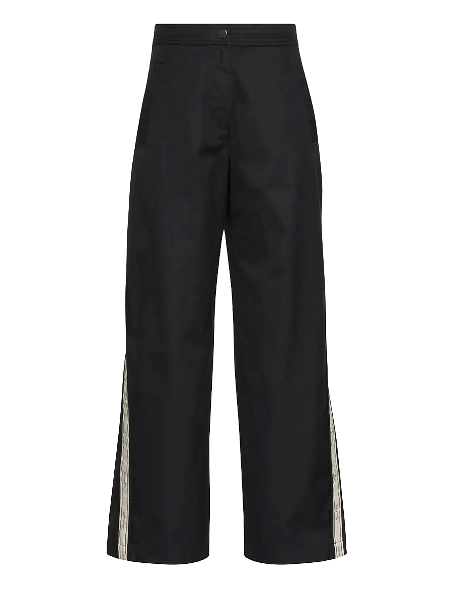 Calvin Klein Jeans - COTTON TWILL AOP LOGO STRIPE PAN - hosen mit weitem bein - black - 1