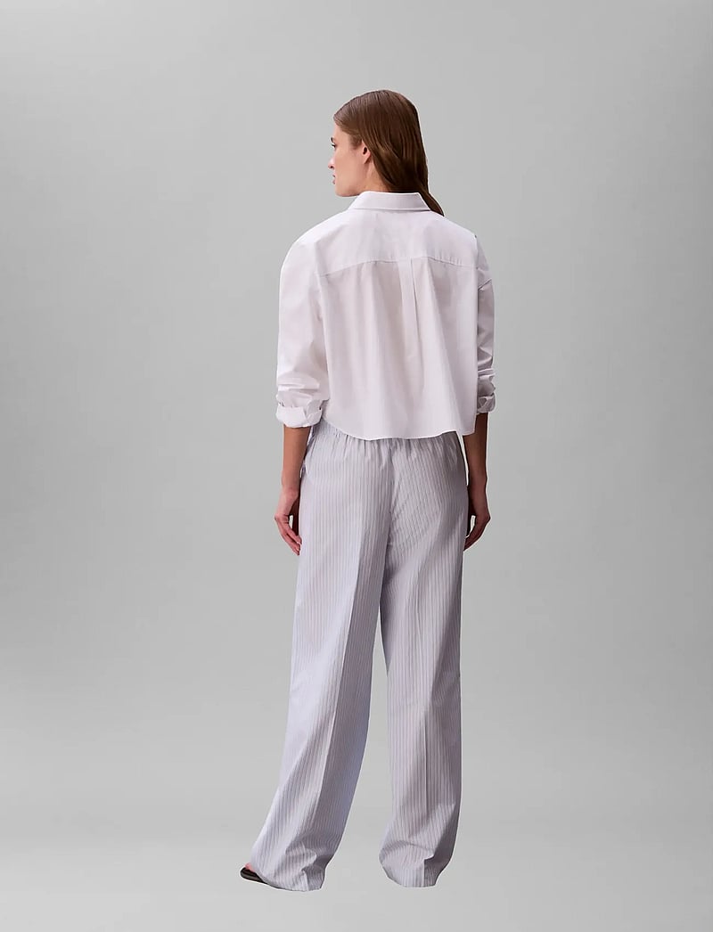 Calvin Klein Jeans - POPLIN EWAIST PULL ON PANT - YD - vida byxor - breezy blue 3 color refined stripe - 2