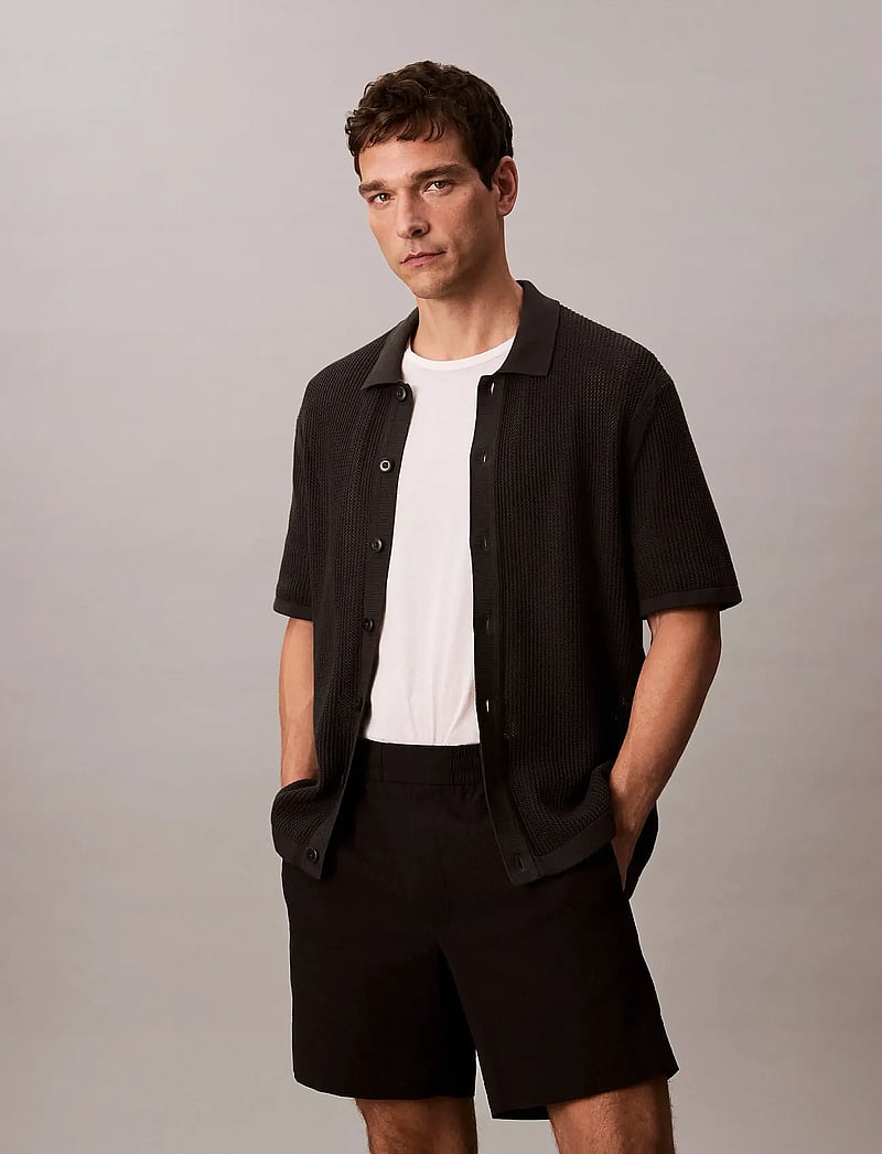 Calvin Klein Jeans - SS CTTN MSH BTTN FRN - short-sleeved shirts - pirate black - 0