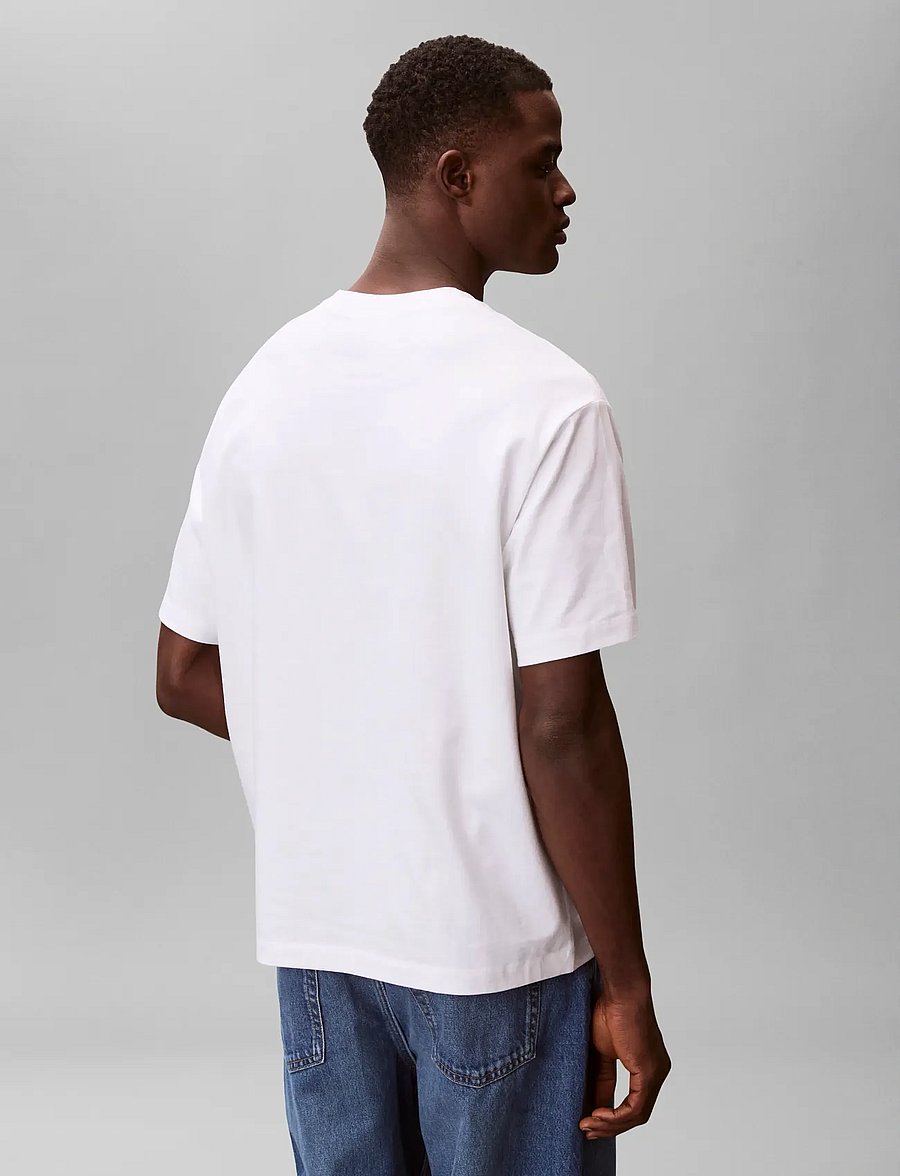 Calvin Klein Jeans - SS 16S RLXD FIT CKJ GRAPHIC TEE - short-sleeved t-shirts - bright white - 2