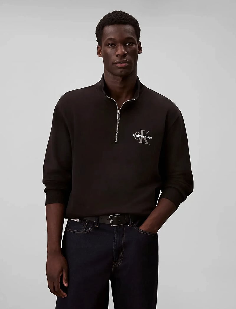 Calvin Klein Jeans - LS EU 350TERRY MICRO MONOLOGO QT - pullover mit halbem reißverschluss - black - 0