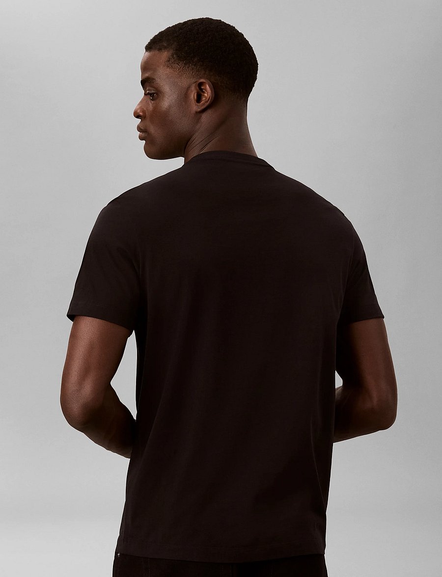 Calvin Klein Jeans - SS 30S EU BOXED CALVIN GRAPHIC T - lühikeste varrukatega t-särgid - black - 2