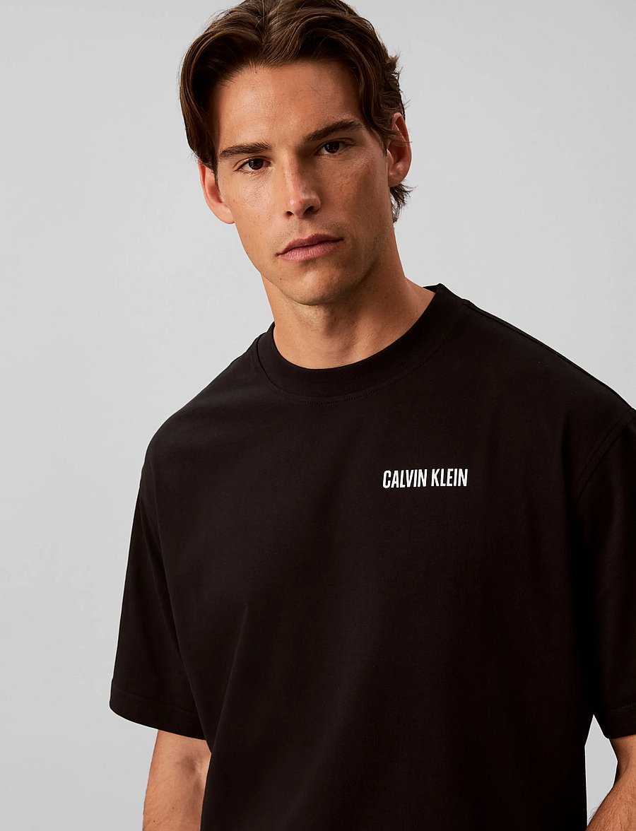 Calvin Klein Jeans - SS RLX 20S CALVIN OR NTHING BCK - lühikeste varrukatega t-särgid - black - 4
