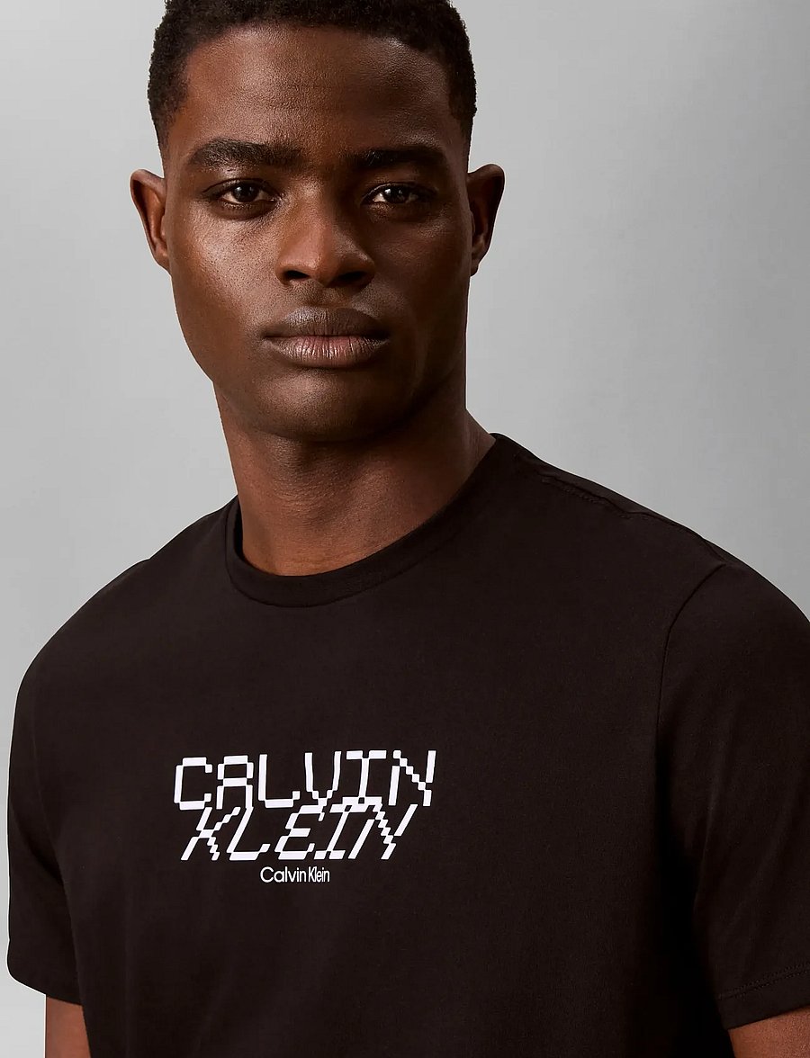 Calvin Klein Jeans - SS 30s WHSL SP CALVIN FUTURA GRA - kurzärmelige t-shirts - black - 5