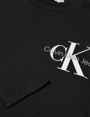 Calvin Klein - CHEST MONOGRAM LS TOP - t-krekli ar garām piedurknēm - ck black - 2