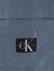 Calvin Klein - STRUCTURED NYLON TRACKPANTS - friluftsbukser - goblin blue - 5