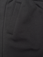 Calvin Klein - PIXEL LOGO RELAXED JOGGER - spodnie dresowe - ck black - 2