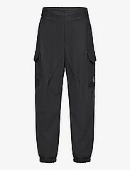 Calvin Klein - PARACHUTE DRY KNIT PANTS - trousers - ck black - 0