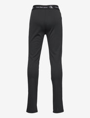 Calvin Klein - PUNTO TAPE SLIT PANTS - bukser - ck black - 1