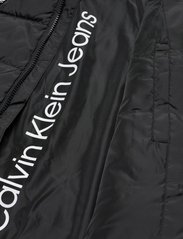 Calvin Klein - MIXED MEDIA BELTED PUFFER COAT - puhvis ja polsterdatud - ck black - 6