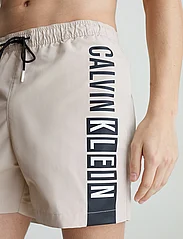 Calvin Klein - MEDIUM DRAWSTRING-GRAPHIC - swim shorts - stony beige - 4
