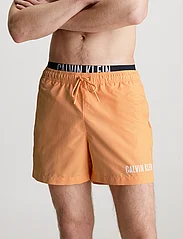 Calvin Klein - MEDIUM DOUBLE WB - swim shorts - buff orange - 1