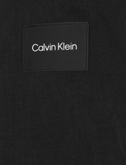 Calvin Klein - CRINKLE NYLON  BLOUSON W. HOOD - pavasara jakas - ck black - 10