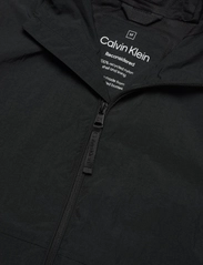 Calvin Klein - CRINKLE NYLON  BLOUSON W. HOOD - spring jackets - ck black - 6