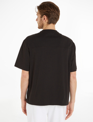 Calvin Klein - SPACE DYE LOGO MOD COMF T-SHIRT - marškinėliai trumpomis rankovėmis - ck black - 3