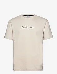 Calvin Klein - HERO LOGO COMFORT T-SHIRT - laveste priser - stony beige - 0