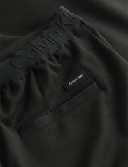 Calvin Klein - COMFORT KNIT TAPERED PANT - ck black - 6