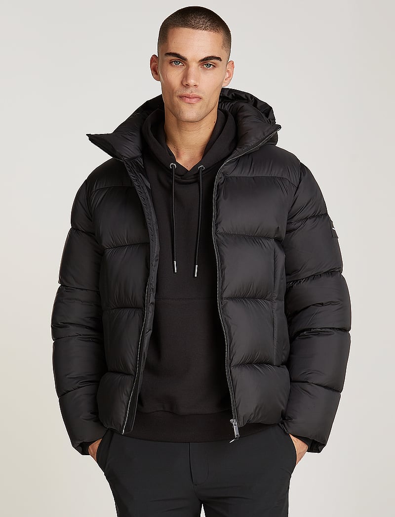 Calvin Klein Hooded Quilt Puffer Mw 226.95 Buy Padded jackets from Calvin Klein online at Boozt . Fast delivery and easy returns