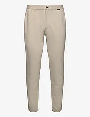 Calvin Klein - COMFORT KNIT TAPERED PANT - kasdienio stiliaus kelnės - stony beige - 0