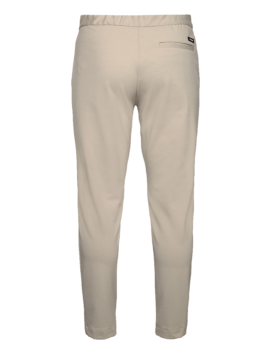 Calvin Klein - COMFORT KNIT TAPERED PANT - stony beige - 1