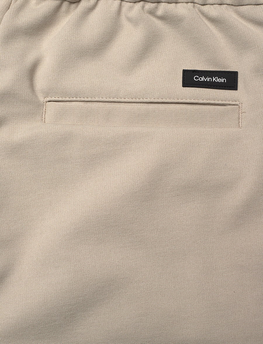 Calvin Klein - COMFORT KNIT TAPERED PANT - stony beige - 4