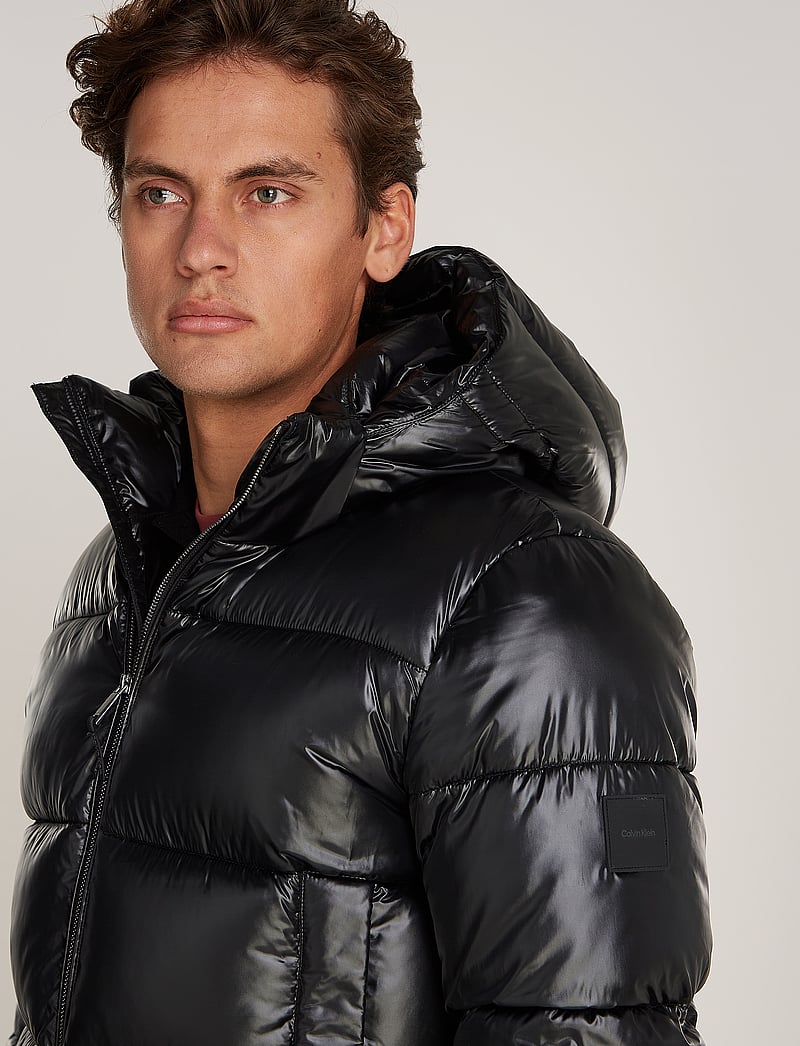 Calvin Klein Hooded Quilt Puffer Mw Gloss 267 Buy Padded jackets from Calvin Klein online at Boozt . Fast delivery and easy returns