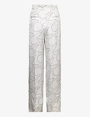 Calvin Klein - MONOGRAM WIDE LEG PANT - odzież imprezowa w cenach outletowych - logo print / vanilla ice - 1