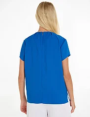 Calvin Klein - METAL BAR SHORT SLEEVE BLOUSE - short-sleeved blouses - parrish blue - 2