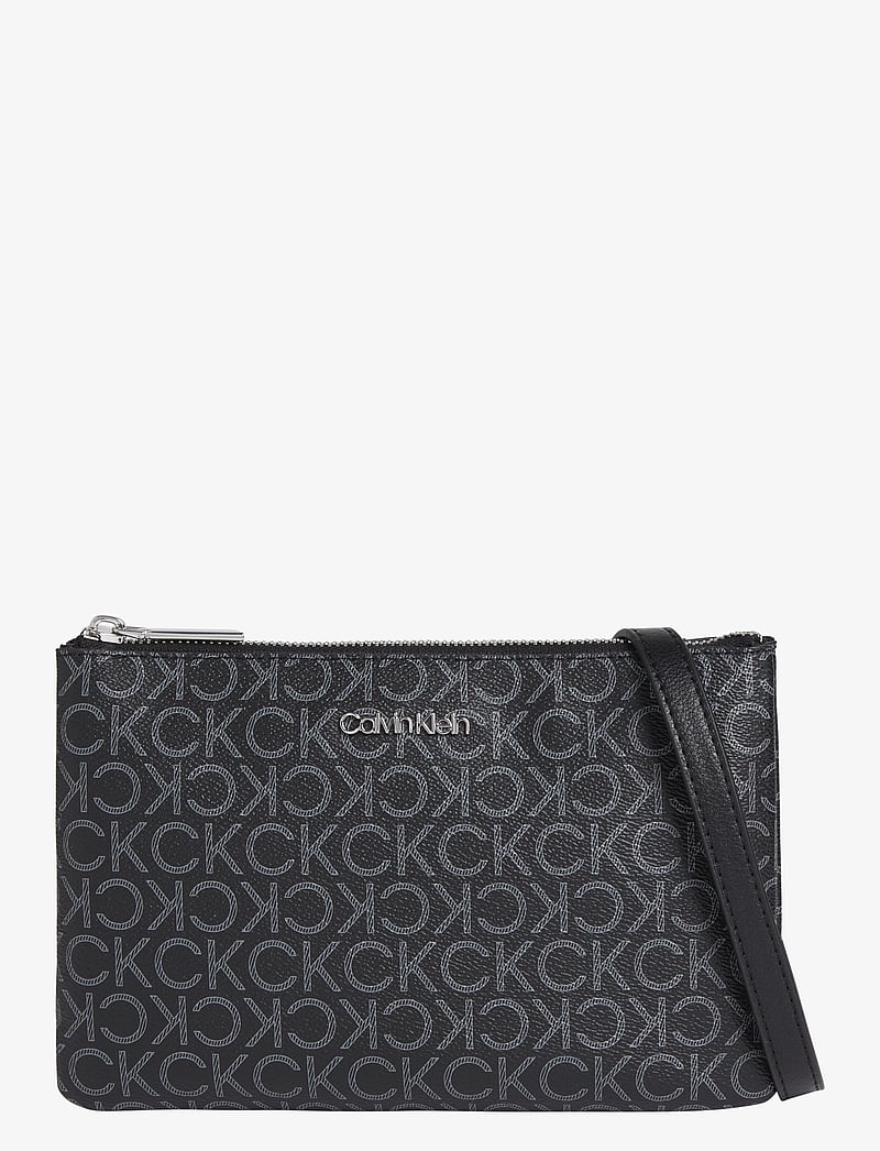 Calvin Klein - CK MUST EW XBODY MONO - crossbody bags - black mono - 1