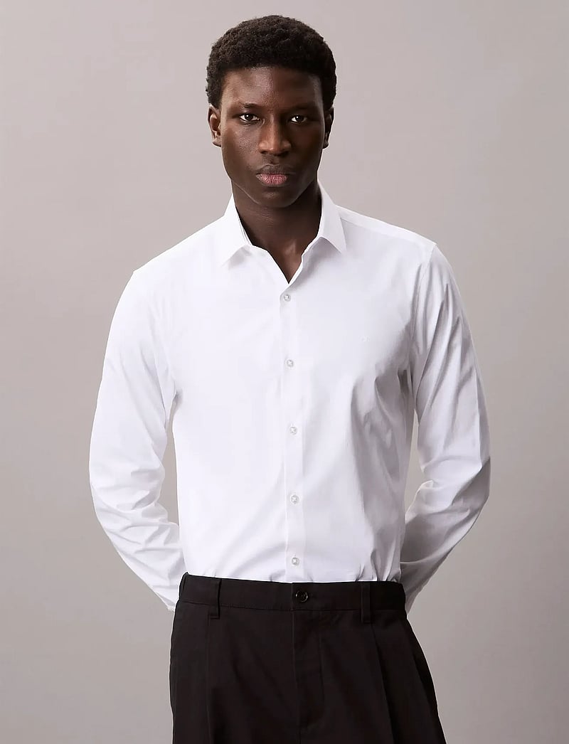 Calvin Klein - SLIM ESNTL POPLIN NOS STR SLD - formelle skjorter - white - 0