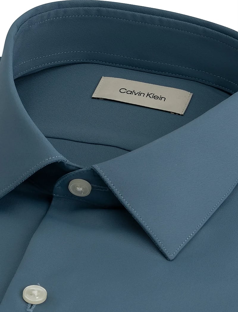 Calvin Klein - SLIM ACTV PERF STR SLD - formelle hemden - teal blue - 1
