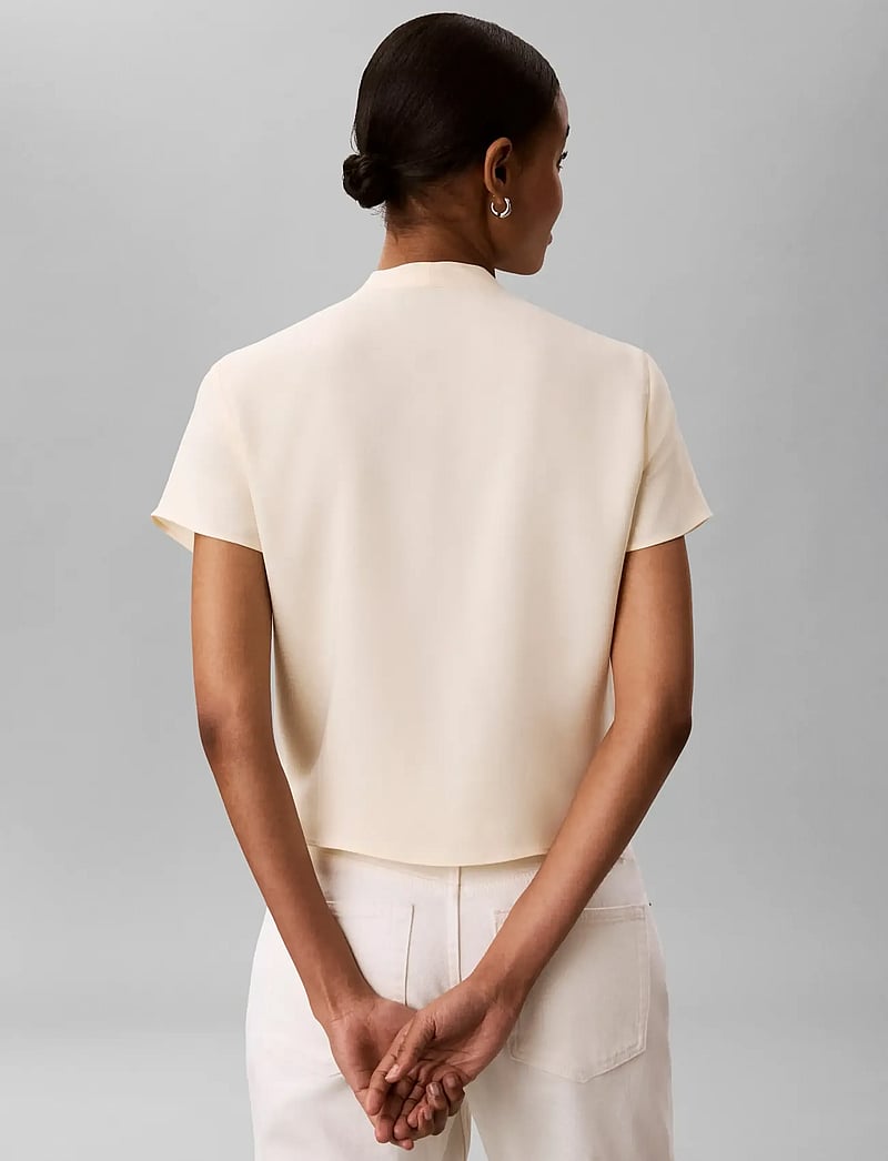 Calvin Klein - CREPE SS DRAPED WRAP TOP - short-sleeved blouses - vanilla custard - 4