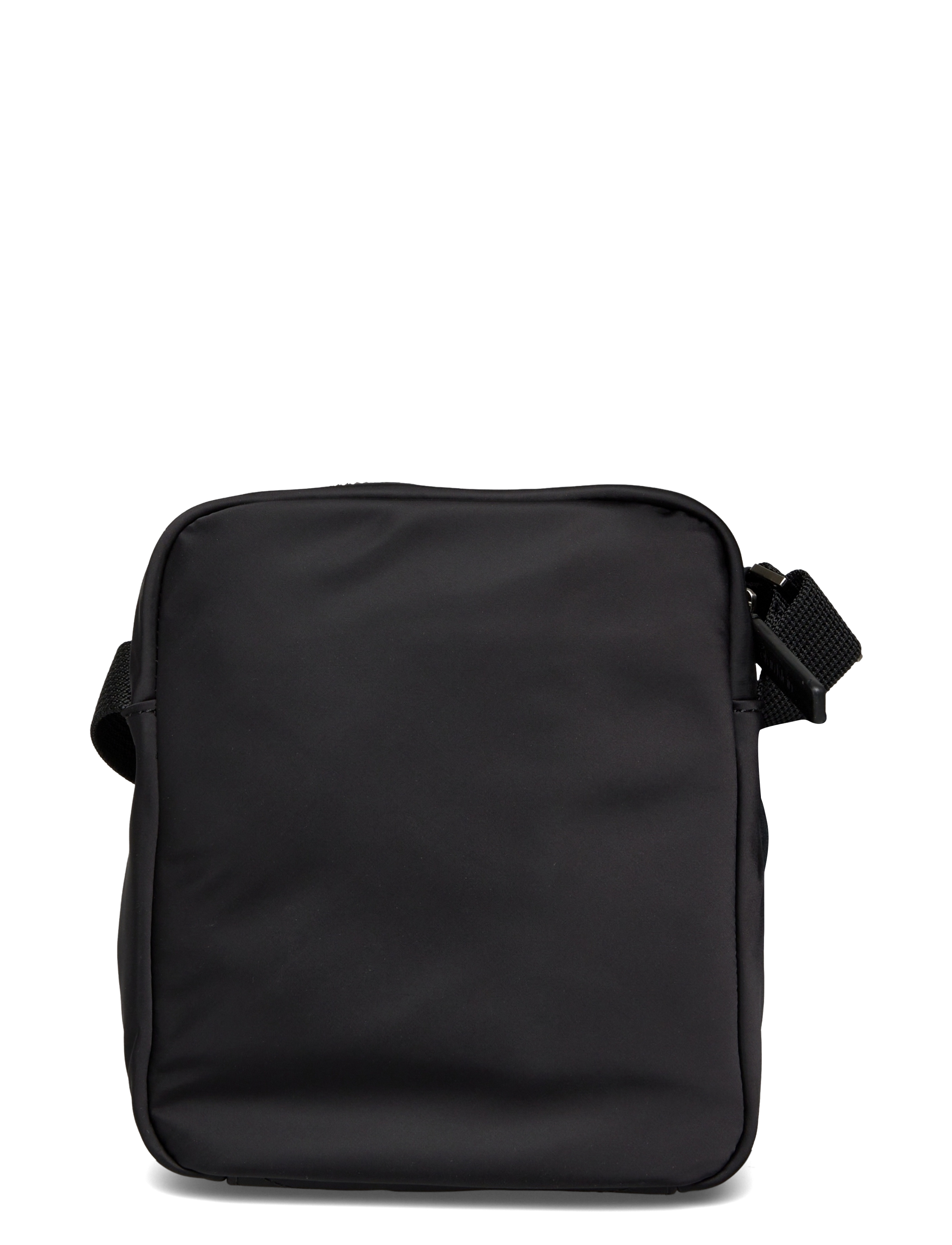 Calvin Klein - SLEEK NYLON REPORTER - torebki crossbody - black - 1