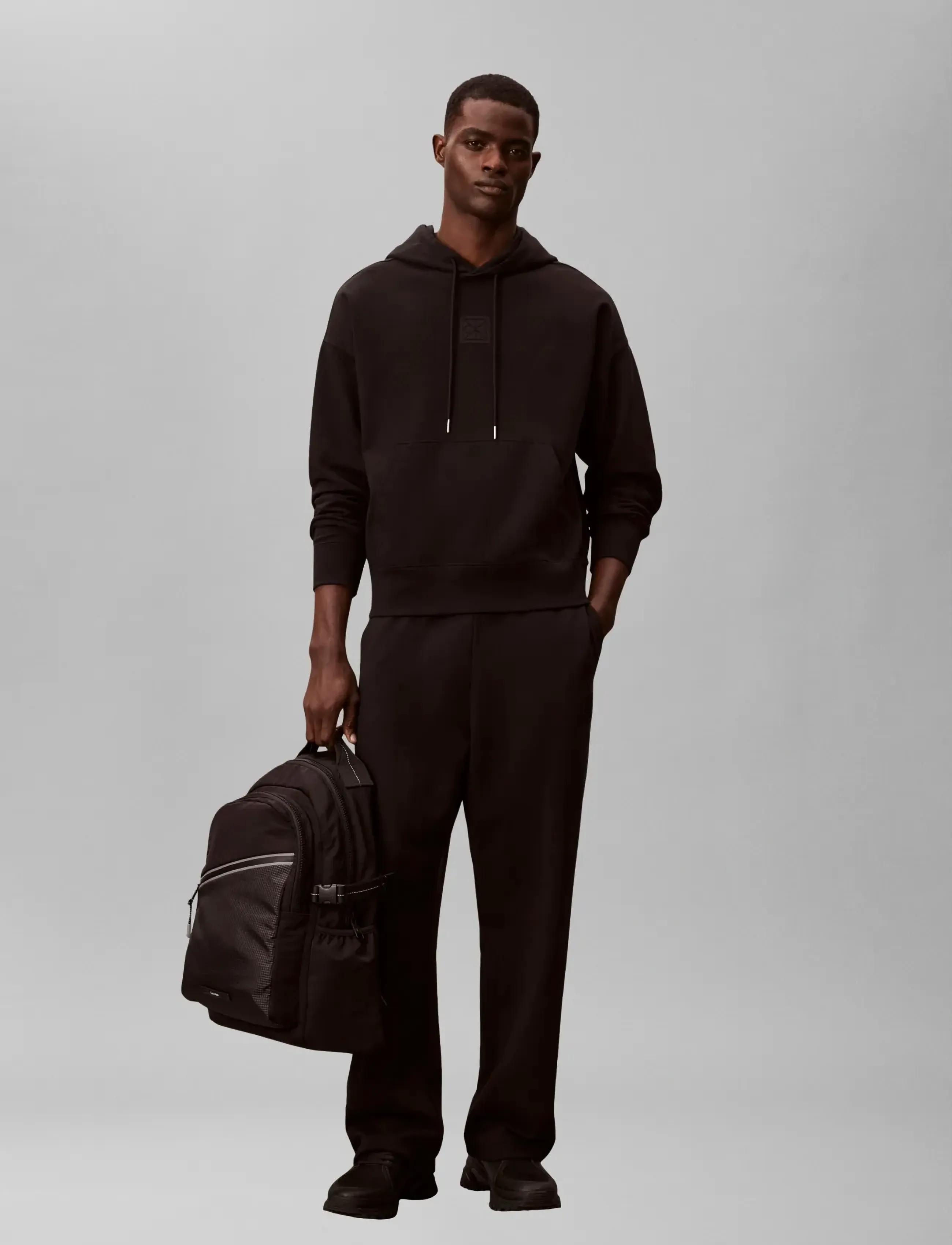 Calvin Klein STRIPED UTILITY ZIP ROUND BACKPA - Bags - BLACK / black