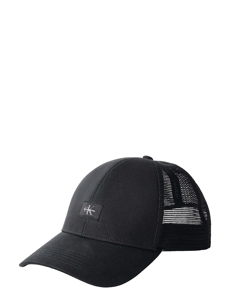 Calvin Klein - MONOLOGO WOVEN PATCH TRUCKER - caps - black - 0