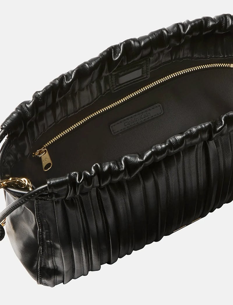 Calvin Klein - DRAWSTRING PLISSE CROSSBODY - crossbody bags - black - 5