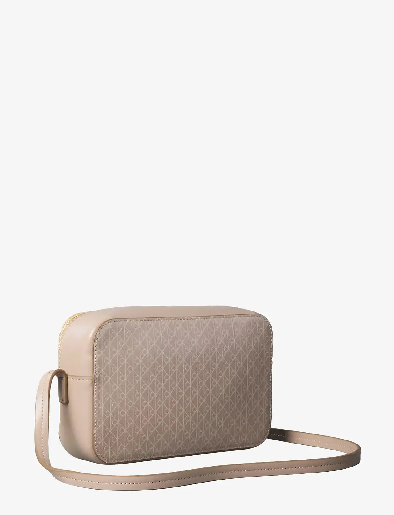 Calvin Klein - EMBLEM AOP ELONGATED CAMERA BAG - crossbody bags - desert taupe aop - 1