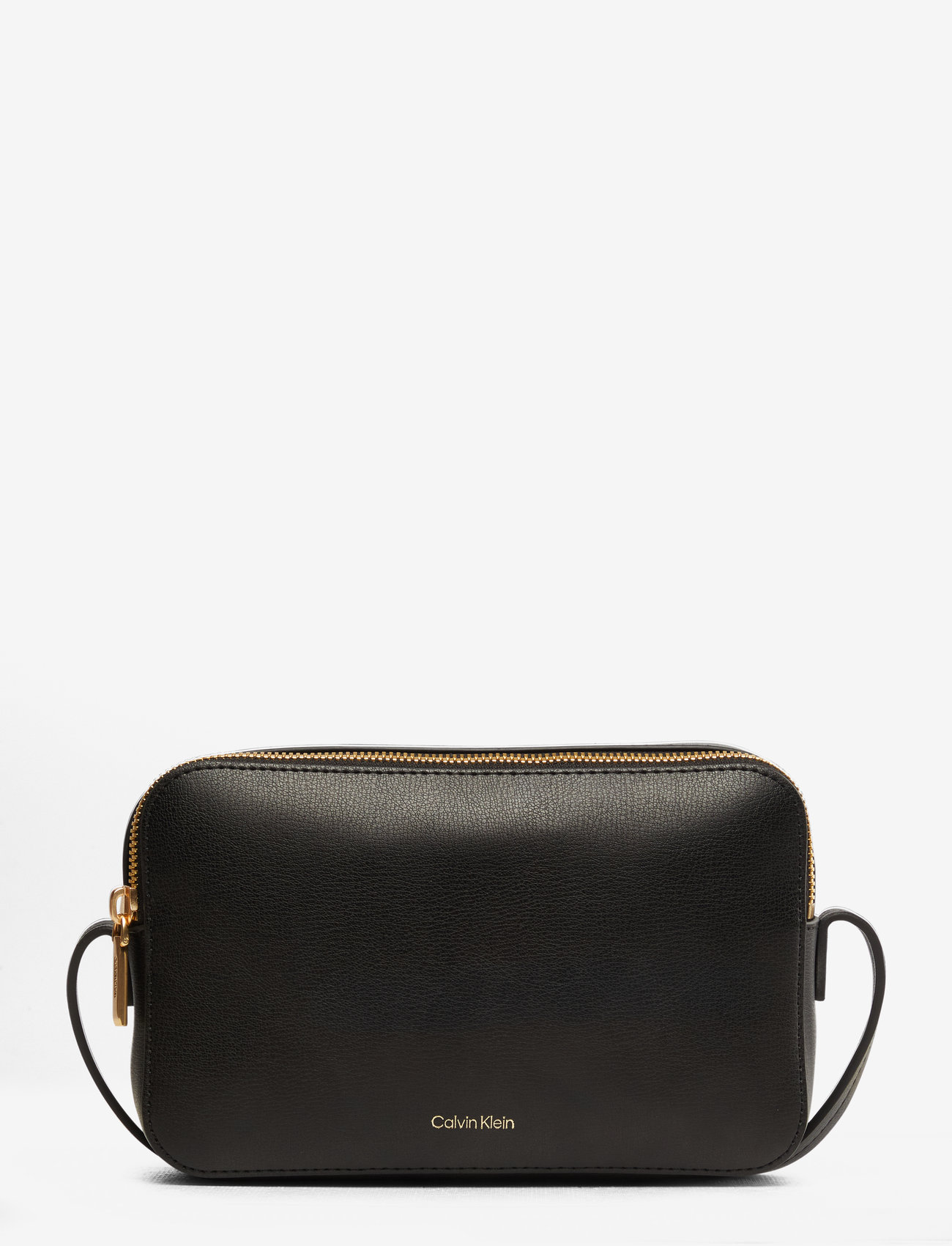 Calvin Klein - FOIL LOGO ELONGATED CAMERA BAG - crossbody bags - black/toasted coconut - 1