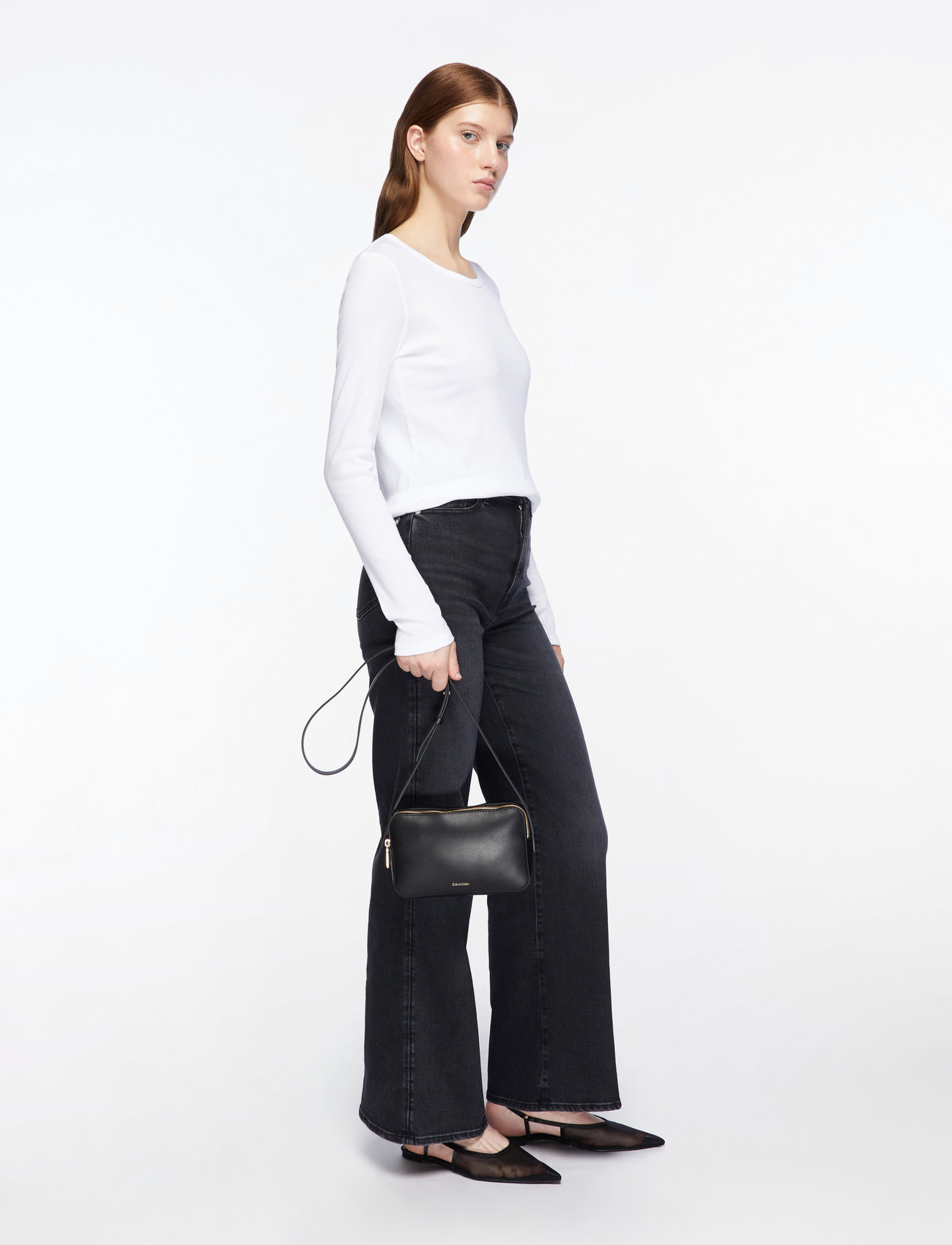 Calvin Klein - FOIL LOGO ELONGATED CAMERA BAG - crossbody bags - black/toasted coconut - 3