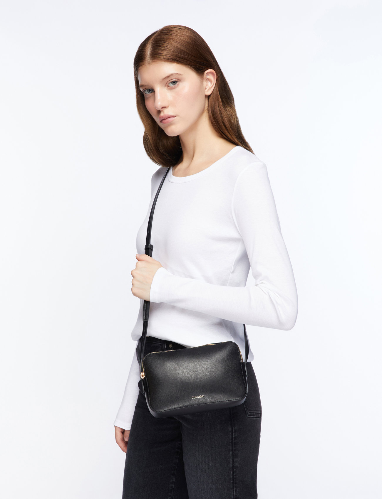 Calvin Klein - FOIL LOGO ELONGATED CAMERA BAG - crossbody bags - black/toasted coconut - 0