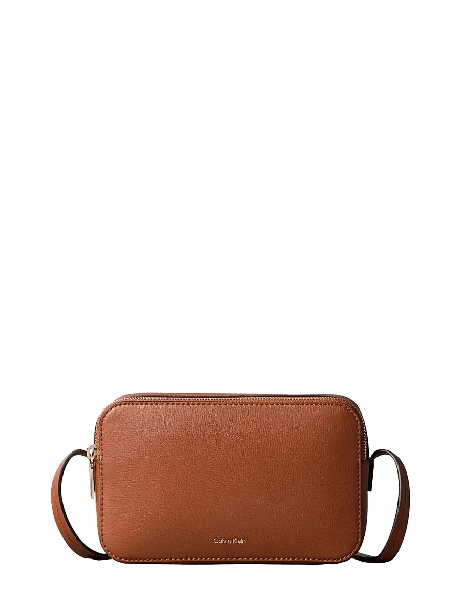 Calvin Klein - FOIL LOGO ELONGATED CAMERA BAG - crossbody bags - natural umber - 0